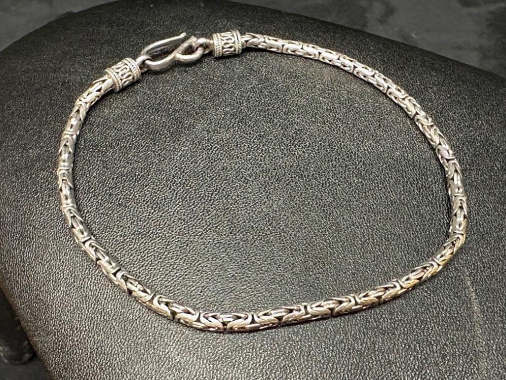 Long Byzantine Link Sterling Bracelet: This piece of jewelry has been tested and researched prior to listing. Please view all our pictures they are part of our description. DETAILS: Metal - Sterling Silver Color - Silver Stones - none Hall