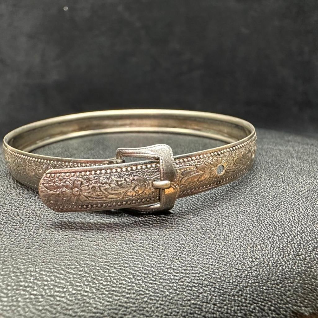 Floral Sterling Belt Bracelet: This piece of jewelry has been tested and researched prior to listing. Please view all our pictures they are part of our description. DETAILS: Metal - Sterling Silver Color - Silver Stones - none Hall
