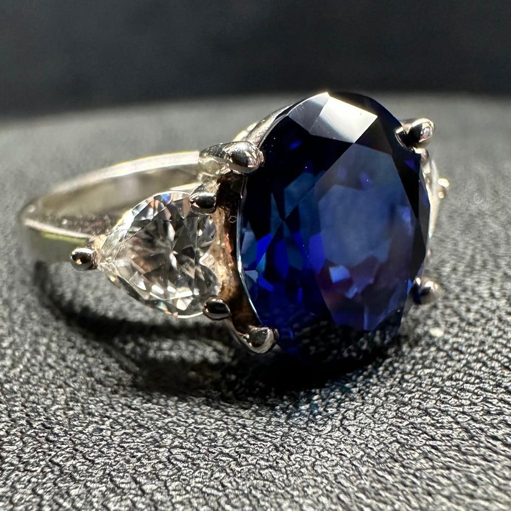 Sterling Lab-Created Sapphire Ring: This piece of jewelry has been tested and researched prior to listing. Please view all our pictures they are part of our description. DETAILS: Metal - Sterling Silver Color - Silver Stones - Sapphire 