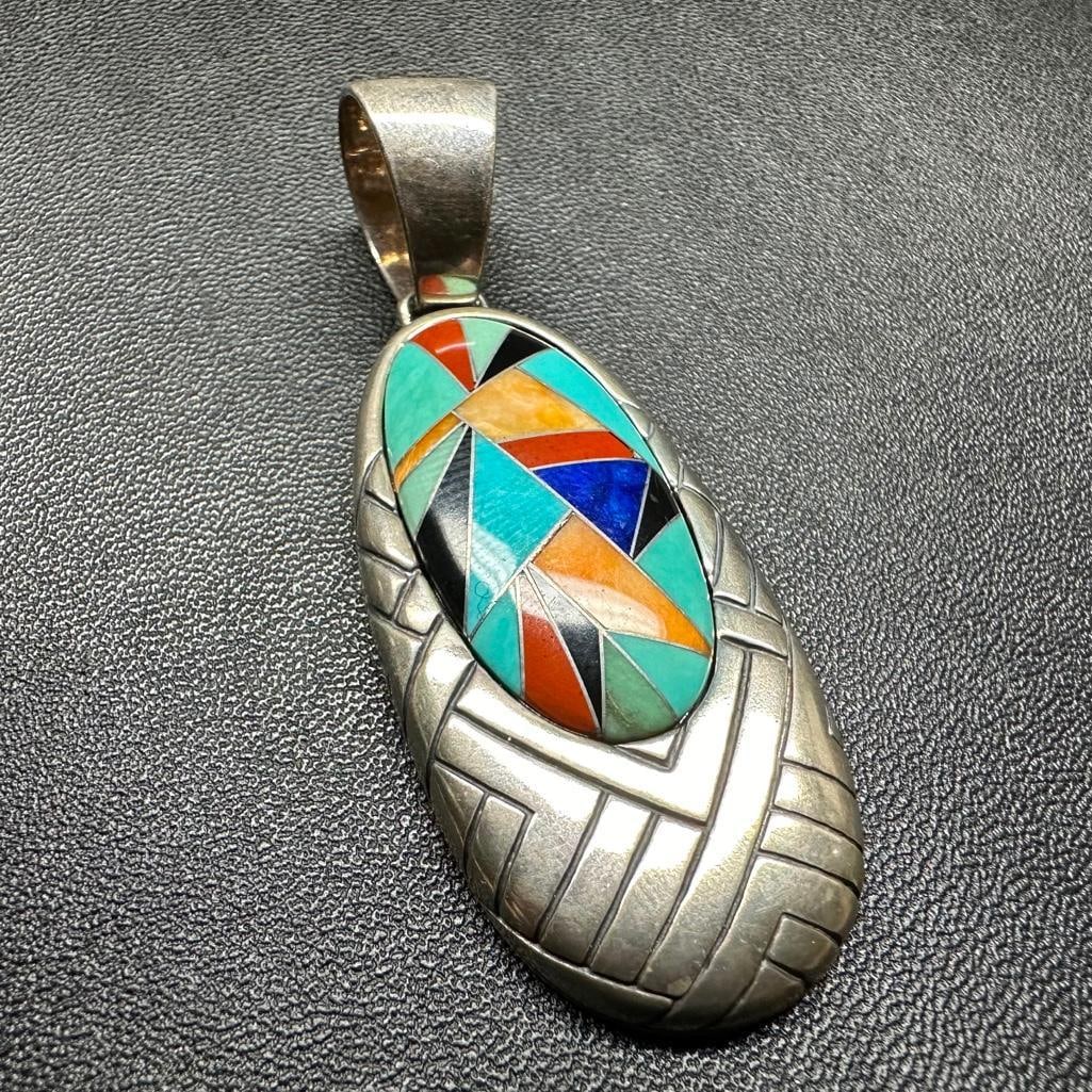 Sterling Silver Zuni-Inspired Mosaic Pendant: This piece of jewelry has been tested and researched prior to listing. Please view all our pictures they are part of our description. DETAILS: Metal - Sterling Silver Color - Silver Stones - Enamel H