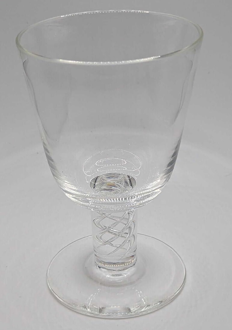 Steuben Crystal Water Goblet With Air Twist Stem A: Steuben Crystal Water Goblet With Air Twist Stem A. This is approx 3 1/4" x 3 1/4" x 5 1/4" and it weighs 0.65lb. It comes with a Steuben-branded storage bag. The bottom center of the base is marked S