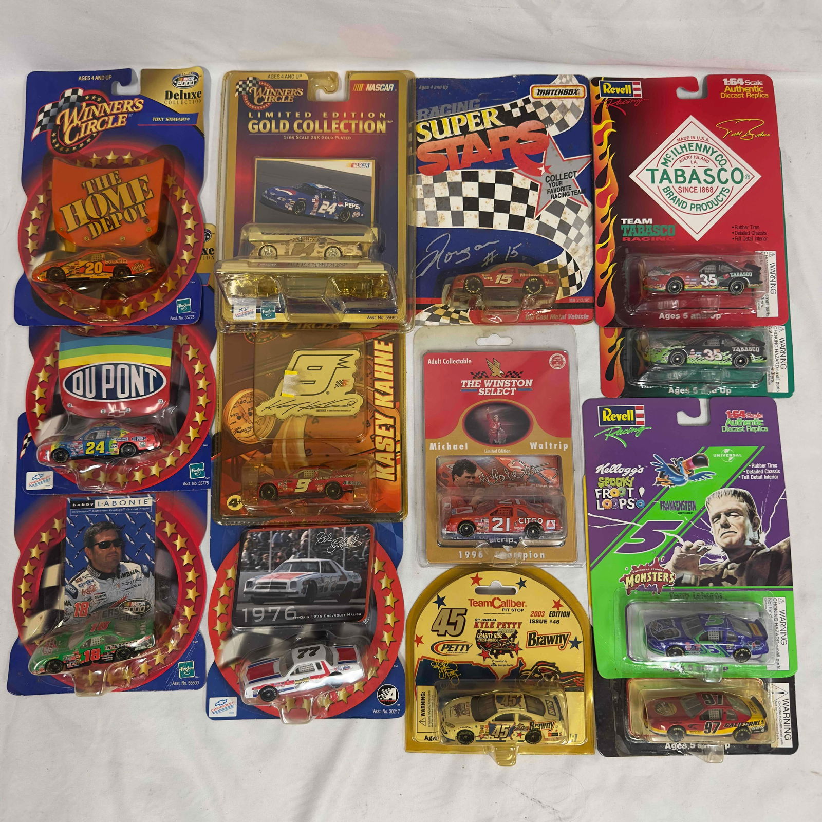 Winners Circle Revell Matchbox 1:64 Scale Collectors Set Lot of 13 Thirteen NASCAR Replica Stock Car: Winners Circle Revell Matchbox 1:64 Scale Collectors Set Lot of 13 Thirteen NASCAR Replica Stock Cars. Various collection of NASCAR replica stock 1:64 scale die cast cars from brands such as Revell, M