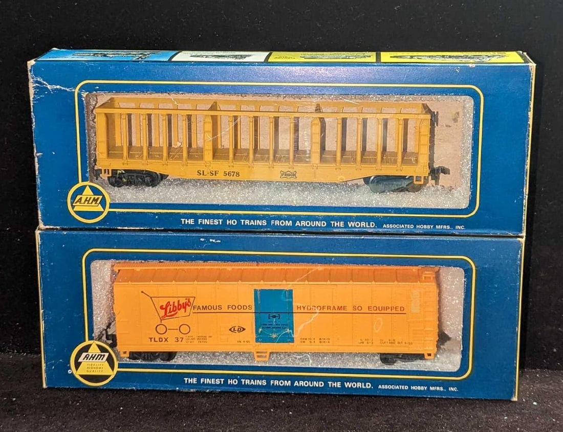 HO Scale Frisco Pulpwood Rack & Libby's Foot Reefer: HO Scale Frisco Pulpwood Rack & Libby's Foot Reefer. This lot includes: (1) A.H.M. HO Scale Frisco Pulpwood Rack Car. This comes in its original box that is approx 10" x 1 5/8" x 3 1/2