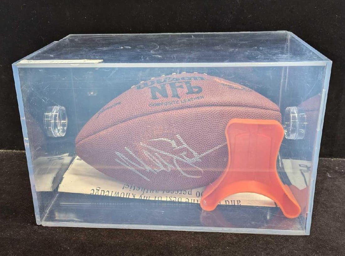 Mike Alstott Autographed NFL Football With Case: Mike Alstott Autographed NFL Football With Case. Autographed football comes with an acrylic case that is approx 11 3/4" x 7 3/8" x 7 3/8" and it weighs 3.20lbs. The case has some cracks and scra