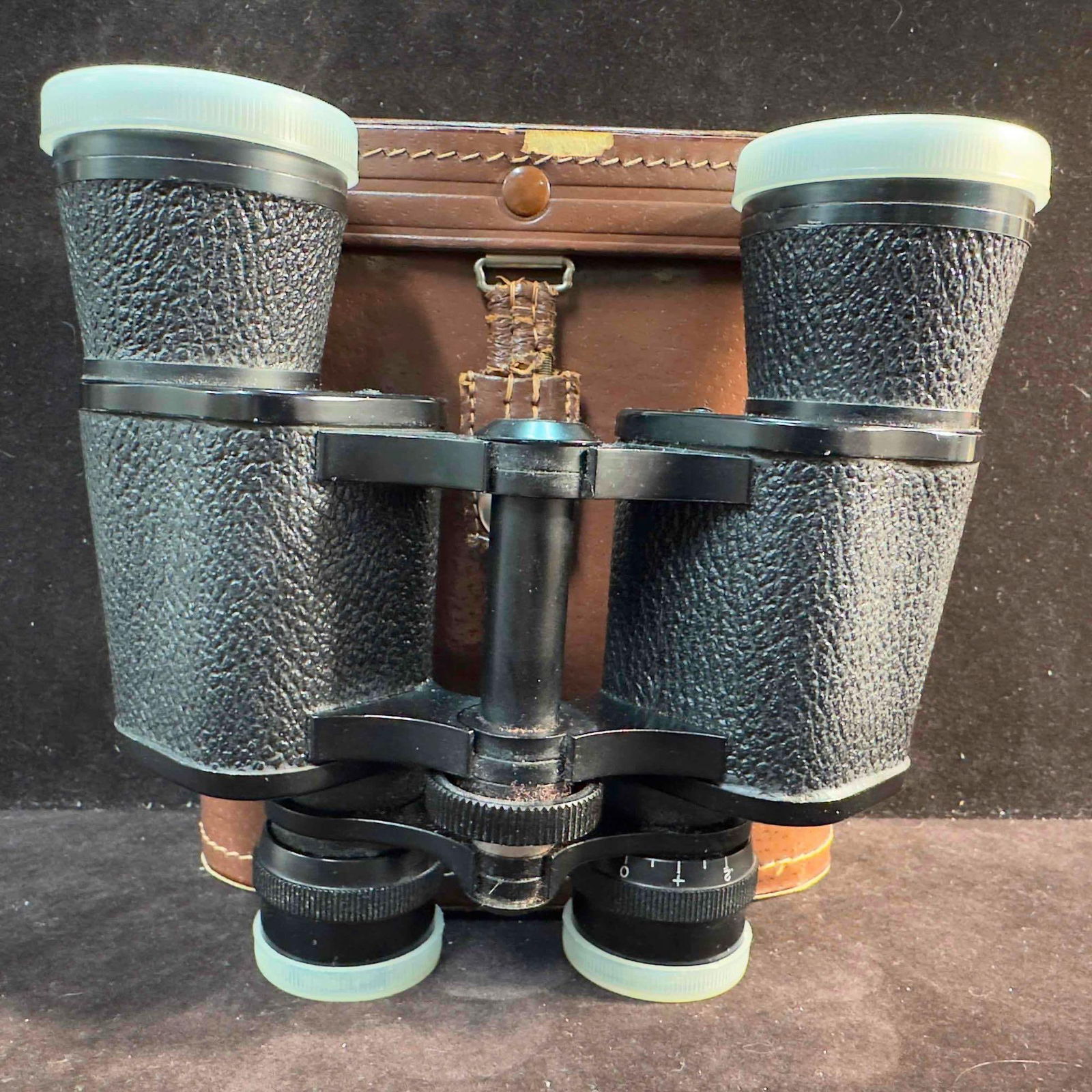 Atcoline Fully Coated Optics No. T-111021 Binoculars 7 x 35 with Hard Case: Atcoline Fully Coated Optics No. T-111021 Binoculars 7 x 35 with Hard Case. Binoculars with hard case, protective plastic caps for both ends included. This item is in good pre-owned, previously displa
