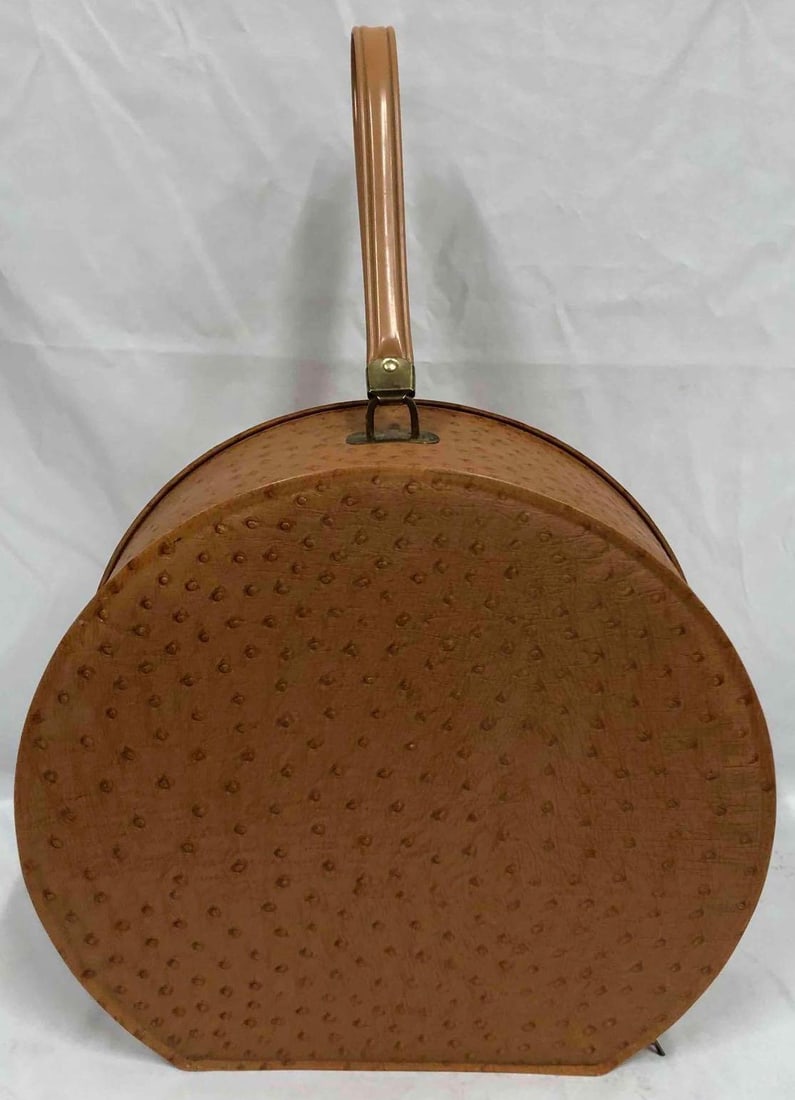 Vintage Faux Ostrich Hat Box: This lot contains a vintage faux ostrich hat box. This hat box is perfect for travel and can be used as luggage for multiple hats on any trip. It is approx 13" x 5" x 12" and weighs about 1.9lbs. The