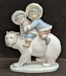 Lladro Eskimo Riders Figurine Kids Polar Bear #5353: Lladro Eskimo Riders Figurine Kids Polar Bear #5353. Lladro Eskimo Riders Porcelain statue by Lladro of Spain depicting two Inuit children riding a polar bear, titled Eskimo Riders. This was originall