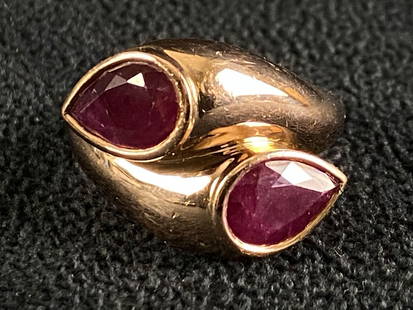 Vintage 18K Rose Gold Unisex Natural 4 TCW Ruby Ring: Vintage 18K Rose Gold Unisex Natural 4 TCW Ruby Ring Metal 18K Rose Gold (Marked & Tested )Stone: Natural RubyShape : Faceted PearSize ; 10mm x 7mm Each Ruby TCW : 2.5 Ct x 2 = 5 Ct