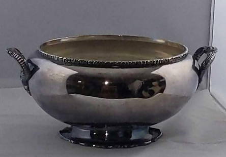 Vintage Silver Plate Serving Bowl With Handles: Vintage Silver Plate Serving Bowl With Handles. Has a company stamp on the bottom but the name is worn. Bowl is approx 12" x 8" x 5 1/2". Is in good, vintage condition with some wearing, scratches, an