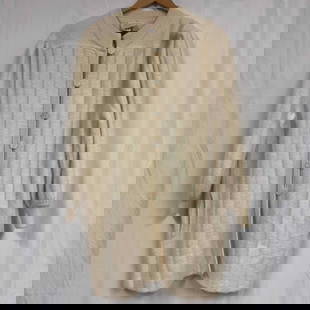 Sondro Wool Cardigan Knitted Sweater Coat White R34: Sondro Wool Cardigan Knitted Sweater Coat White R34. This sweater coat features a pearl accent button closures. Two front pockets located on either side. Ribbed shoulders. The sweater is white cream c