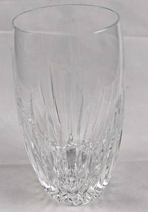 Baccarat Crystal Massena Highball Glass: The intricate detailing gives the Massena highball a barrel-like appearance and a textural feel. This artful handiwork puts the upper smoothness of the glass in sharp relief. The polished silhouette