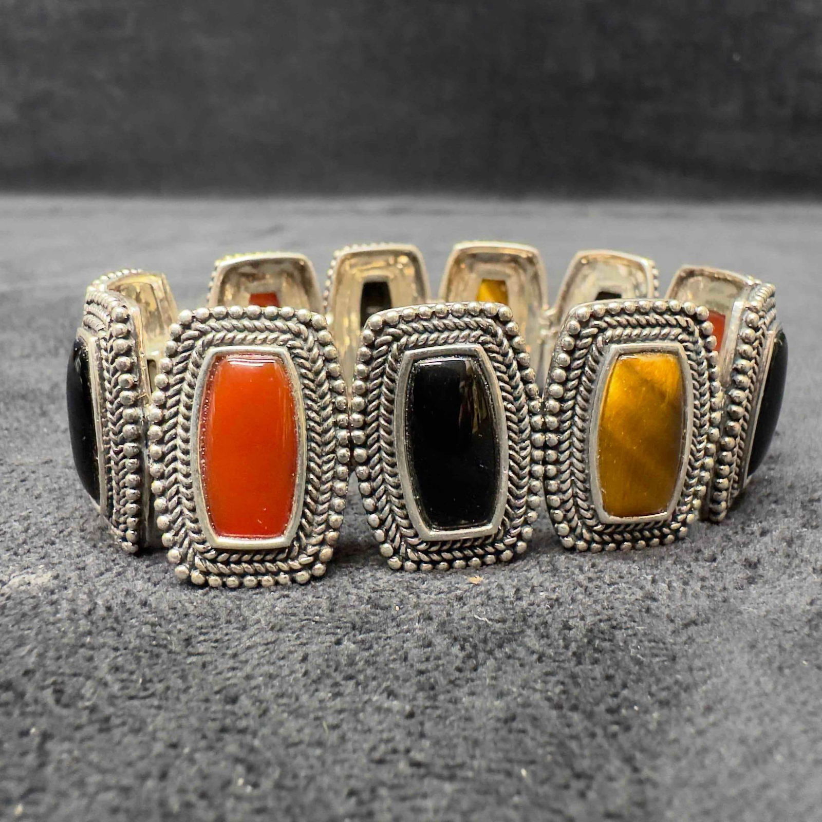 Tigers Eye Carnelian Black Onyx Ornate Beaded Bezel Sterling Silver Bracelet: This item is in good pre-owned, previously used/displayed condition with noticeable light wear, and surface scratches. Please reference all photos for full details. This piece of jewelry has been test