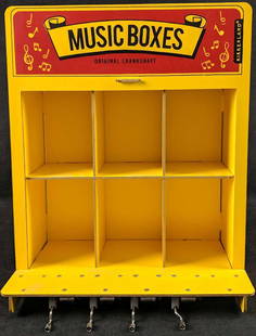 Kikkerland Store Display With Four Music Boxes: Here is a Kikkerland display box for their popular music boxes. This display has six 3 1/2" x 4" x 4 1/2" openings that can be used to display/store anything that size. Was used for boxed Kikkerland&n