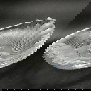 Lalique Nancy Ashtray: Lalique Nancy Ashtray  Nancy pattern ashtray by Lalique, in clear crystal with their signature frosted texture. The ashtray stands approximately 2.5&#34; tall, 8&#34; to 7&#34; in diameter, and weighs