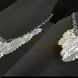 Sterling Silver Mother of Pearl Circles Necklace: This piece of jewelry has been tested and researched prior to listing. Please view all our pictures they are part of our description. DETAILS: Metal - Sterling Silver Color - Silver Stones - none Hal