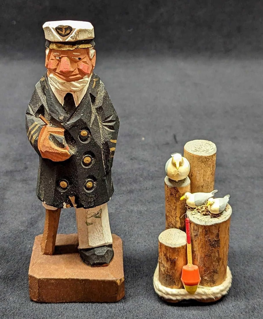 Wooden Sea Captain With Seagull Figurines.: Wooden Sea Captain With Seagull Figurines. These two little wooden figures will add a touch of the sea to any desk, shelf, counter, or any flat surface on which they are placed. This lot includes: (1)
