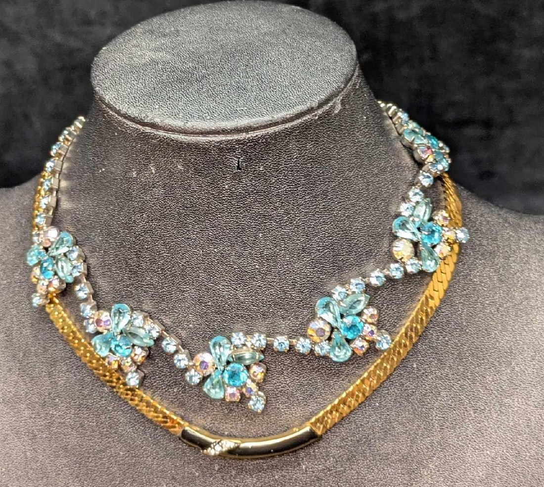 Vintage Napier Gold Tone And Silvertone Rhinestone Choker Necklaces: Vintage Napier Gold Tone And Silvertone Rhinestone Choker Necklaces. This lot includes: (1) Napier Gold Tone With Rhinestones Choker Necklace. This is approx 15". (1) Unmarked Silver Tone Blue And