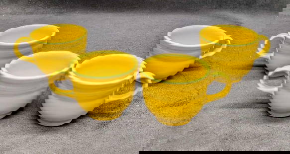 4 Fiestaware Sunflower Yellow Flat Cups: 4 Fiestaware Sunflower Yellow Flat Cups. Each cup is approx 4 1/2" x 3 1/2" x 2 3/4" and the total weight is 2.48 lbs. One of the cups has a small chip/imperfection on the bottom.