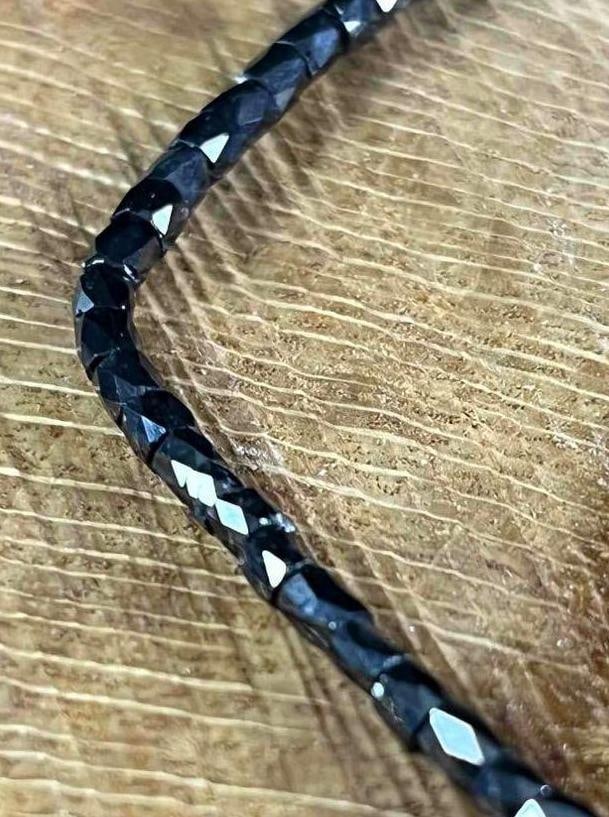 Black Diamond Bead Strands Jewelers Findings: Black Diamond Bead Strands Jewelers Findings This lot has 16in strands of black diamond faceted beads and an additional 11 teardrop-shaped black diamond beads. The beads are in good condition with no