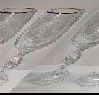 2 Import Assoc Cascade Gold Water Goblets B: 2 Import Assoc Cascade Gold Water Goblets B. Each is approximately 3" x 3" x 5 3/4" and the total weight is 0.70lb. Each goblet has no chips or cracks. There are some very small white spots on the bas