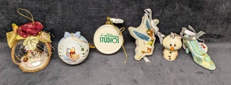 6 Disney Frozen Pooh Mickey Mouse Tinkerbell Ornaments: 6 Disney Frozen Pooh Mickey Mouse Tinkerbell Ornaments. This lot includes:  (1) Hallmark - Itty Bittys Oraf Ornament. This is approx 2&#34; x 2&#34; x 3 1/2&#34;. (1) Disney Hollywood Studios - Osborn