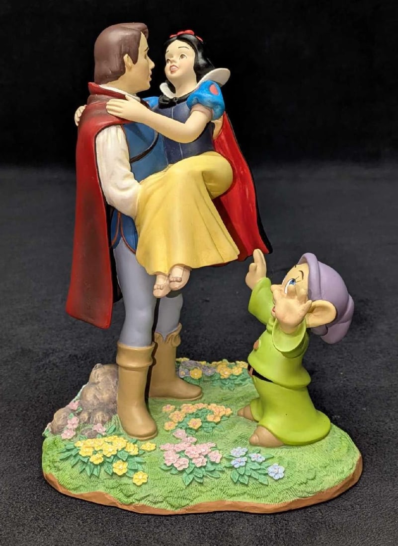 Disney Animated Classics Snow White Prince Dopey Figurine: Disney Animated Classics Snow White Prince Dopey Figurine. This was originally sold at the Disney parks and resorts. This is approx 6 3/4" x 6" x 5 1/2" and it weighs 1.65lb. The figurine appears to b