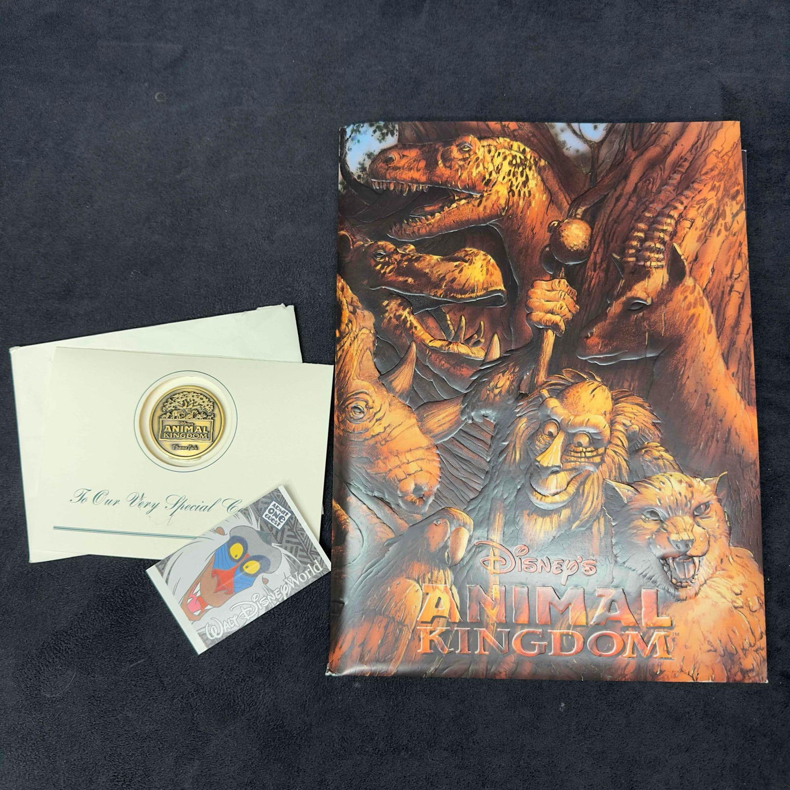 Animal Kingdom Media Relations Cast Member Opening Day Folder Photos Coin (1 of 10)