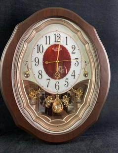 Small World Rhythm Precious Angels Quarts Clock: Small World Rhythm Precious Angels Quarts Clock Precious Angel's quartz Rhythm wall clock by Small World. In good condition with no known damage. Clock takes two D batteries and is currently work
