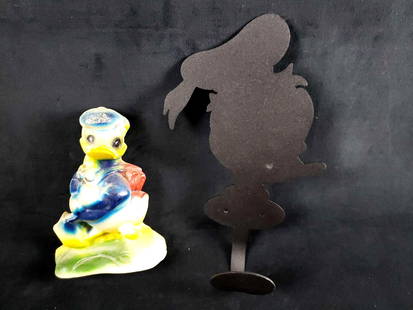 Vintage Disney Donald Duck Coat Hanger and Bookend Lot: Vintage Disney Donald Duck Coat Hanger and Bookend Lot. This lot of two Donald Duck vintage items is in overall good to great used condition. The items in this lot are: 1 plaster Donald Duck bookend.