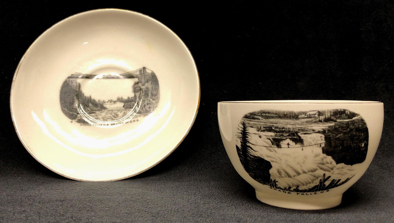 Myotts England - Royal Grafton China - Tea Cup and Saucer - Grand Falls, New Brunswick: Myotts England - Royal Grafton China - Tea Cup with Handle and Saucer - Grand Falls, New Brunswick - Black and White. Tea Cup 4-1/4" x 3-1/2" x 2-1/4" Saucer 5-1/2" x 5-1/2" x 3/4