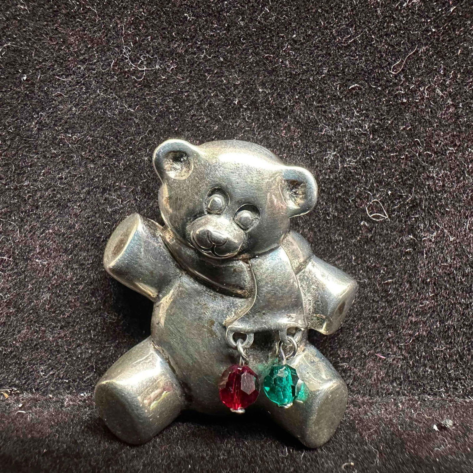 Teddy Bear Christmas Holiday Theme Sterling Silver Brooch: This item is in good pre-owned, previously used/displayed condition with noticeable light wear, and surface scratches. Please reference all photos for full details. This piece of jewelry has been test