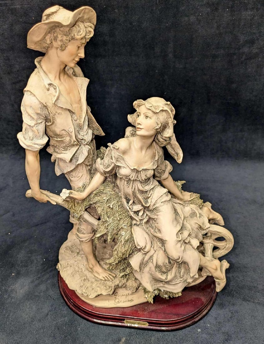 LE Giuseppe Armani Back From The Fields Capodimonte Figurine: LE Giuseppe Armani Back From The Fields Capodimonte Figurine. This one is #527 out of #1000. This is approx 10" x 7" x 15". It comes with the COA and original box that is approx 18 3/8" x 13 1/4