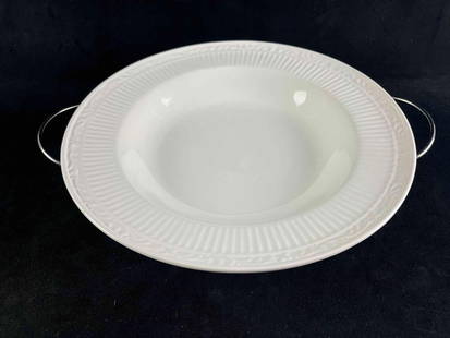Large Ceramic Bowl with Serving Stand: Large Ceramic Bowl with Serving Stand This is a large bowl with a serving stand by the brand International. This bowl has an imprinted decorated rim and sits on top of a metal rack. These items are in