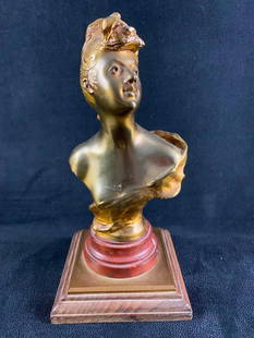 Bust of a Woman by Henri Vidal JB: Bust of a Woman by Henri Vidal  Bronze bust of a woman, by French sculptor Henri Vidal. On a wood and resin base. The piece has the signature of the artist and is numbered 122 out of an unknown number