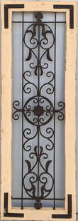 Metal Wall Home Decor Rustic Decoration: Metal Wall Home Decor Rustic Decoration This item is a lovely wall decoration that replicates an ornate garden gate framed in wood. The wood has a rustic finish but also a few flaws that are pictured.