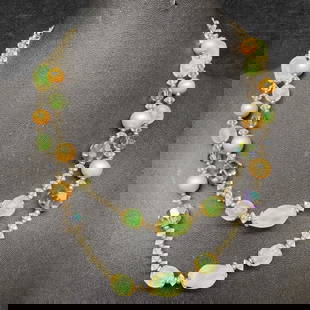 Murano Venetian Lamp Work Art Glass Clear Green Beaded Double Layered Necklace G20: Murano Venetian Lamp Work Art Glass Clear Green Beaded Double Layered Necklace G20. Necklace with clear green colored glass beads with beautiful designs on each. The necklace has clear plastic beaded