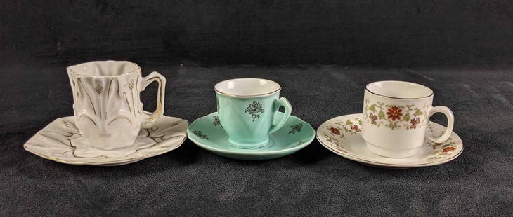 Small Tea Cups and Saucers: Small Tea Cups and Saucers  Lot of three small teacups and saucers. These are adorable teacups for small tea parties. These are unknown brands of teacups they are all in good condition. They have slig