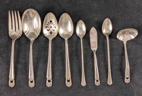 Eight Vintage Eternally Yours Silverplate Silverware: This lot includes eight &#34; Eternally Yours&#34; Silverplate Dinnerware by International Silver. This retired series was released from 1941 - 1973. This includes:  (1) Solid Gravy Ladle. This is app