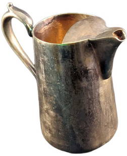 Vintage Silver Plated Water Pitcher: Vintage Silver Plated Water Pitcher. Is approx 9" x 5" x 9" and it weighs 2.55lbs. Is in a good, vintage condition with surface tarnish and scratches.&nbsp;&nbsp;