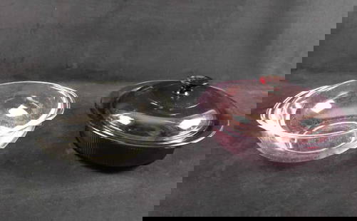 Two Pyrex And Vision Glass Cookware: This lot includes:  (1) Clear Pyrex Glass Bowl With Handles. Safe for the oven. Is approx 10&#34; x 10&#34; x 3&#34;. Has small scratches between glass. (1) Vision Cranberry Colored Glass Bowl With Li
