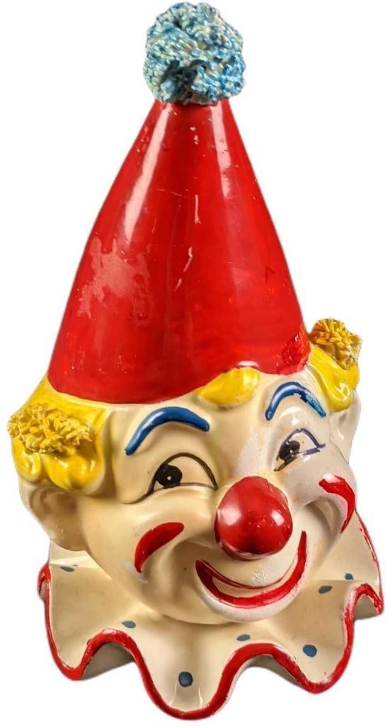 Vintage Ceramic Hand Painted Clown Head Vase: Here is a vintage ceramic hand-painted clown-head vase. Its maker and date of creation are unknown. The vase is approx 4 1/4" x 4 1/4" x 7" and it weighs under one pound at 0.84lb. The vase is in a go