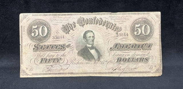 1864 $50.00 Confederate States Of America Richmond Currency Note (A): This lot contains a 1864 $50.00 Confederate States Of America Richmond Currency Note (A). Obverse: Jefferson Davis, President of the C.S.A. It is approx 3/4" x 7 1/4". Total weight is less than 1gram.
