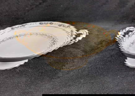 Ceramic Hand Painted Serving Bowl: This hand-painted bowl is from Nippon. This bowl has some age damage such as faded paints and discoloration. Overall this bowl is in good condition with no known cracks or chips. This bowl has hand-pa