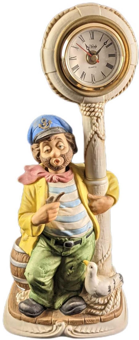 Rare Melody In Motion Clockpost Willie The Sailor: Rare "Melody In Motion" Clockpost Willie The Sailor. This originally had a working clock and would make whistling sounds while the figurine's head would move. These currently do not work, but it's sti