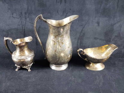 3 Silver Plated Pieces: 3 Silver Plated pieces. These three silver plated pitchers and gravy boat are in good used conditions. There is a substantial amount of tarnishing on the pieces which needs to be polished off. The pie