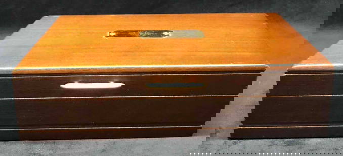 Wooden Jewelry Box: This lot contains a wooden jewelry box. The box has a small plaque on the front engraved with the initials gSa. It is approx 12" x 8" x 3" and weighs about 2.3lbs. The jewelry box features a red felt