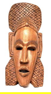 Handmade African Carved Wood Tribal Mask: Handmade African Carved Wood Mask. Item does not have a hook for hanging on wall. The mask is approximately 12" x 5-1/4" x 2-1/2" and weighs about 1.2lbs. Overall the Handmade Mask is in good used con