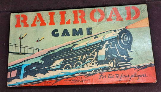 Vintage Milton Bradley Railroad Game 1940: Vintage Milton Bradley Railroad Game 1940. It comes in its original box that is approx 14 1/4" x 7 3/4" x 1 1/4" and it weighs 0.32lb. The box has some shelf wear and the game is missing some of the p