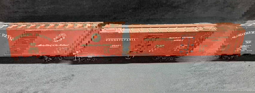 2 Vintage Distressed Northern Pacific & Penn Boxcars O Scale: 2 Vintage Distressed Northern Pacific &amp; Penn Boxcars O Scale. This lot includes:  (1) Northern Pacific &#34;Main Street Of The Northwest&#34; 15827 Boxcar. The couplers are marked &#34;Kadee&#34;.
