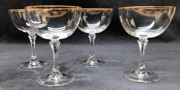 Lenox "Mansfield" Crystal Gold Rim Champagne Glasses: Lenox "Mansfield" Crystal Gold Rim Champagne Glasses.&nbsp;This lot contains a Set of 4 Lenox "Mansfield" Gold Rim Crystal Champagne Glasses. Each glass is approx 5-1/4" tall with 5" diameter. Combine